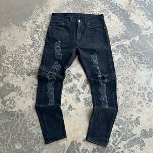 Levi’s 512 thrashed distressed jeans